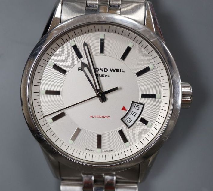 A gentlemans modern stainless steel Raymond Weil automatic wrist watch, with original box.